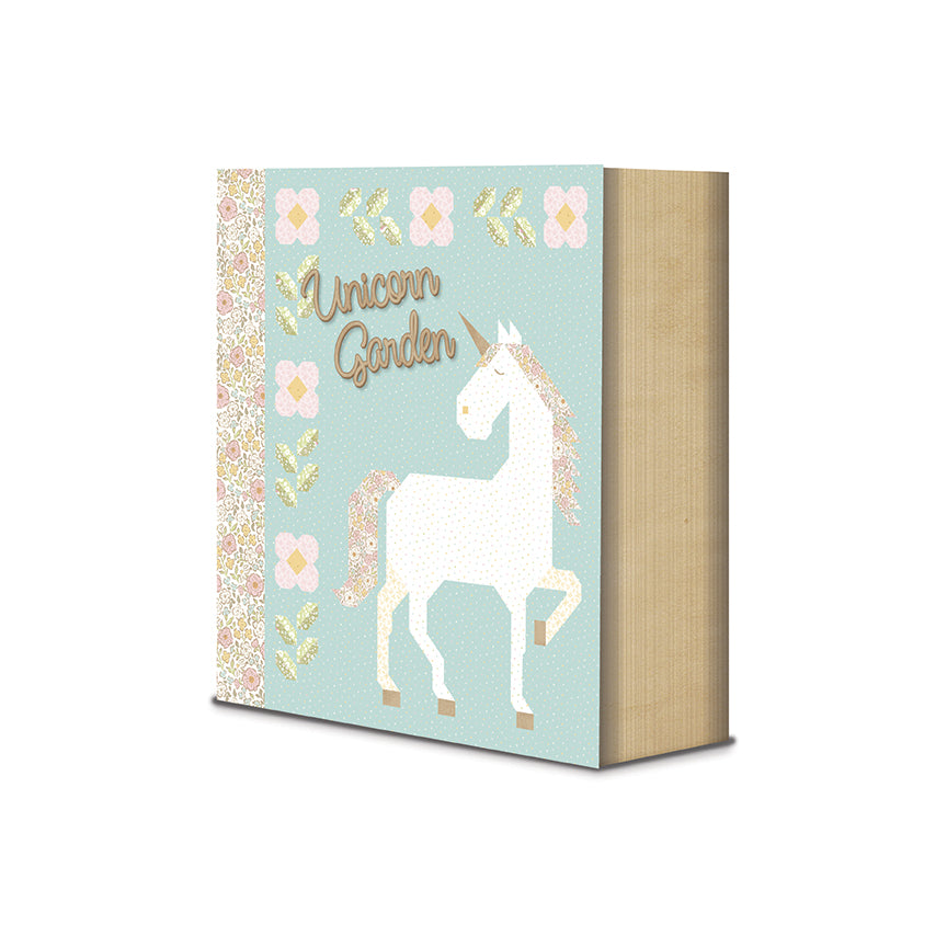 Book with unicorn design and 'Unicorn Garden' text on a light blue background