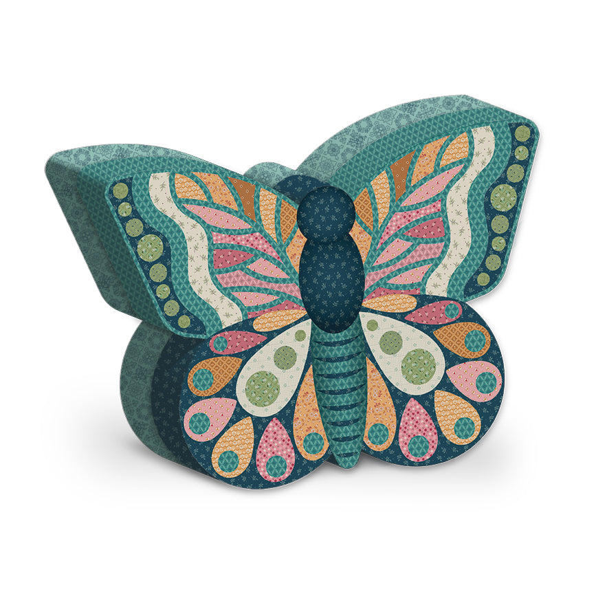 Colorful butterfly-shaped object with a pattern on a white background