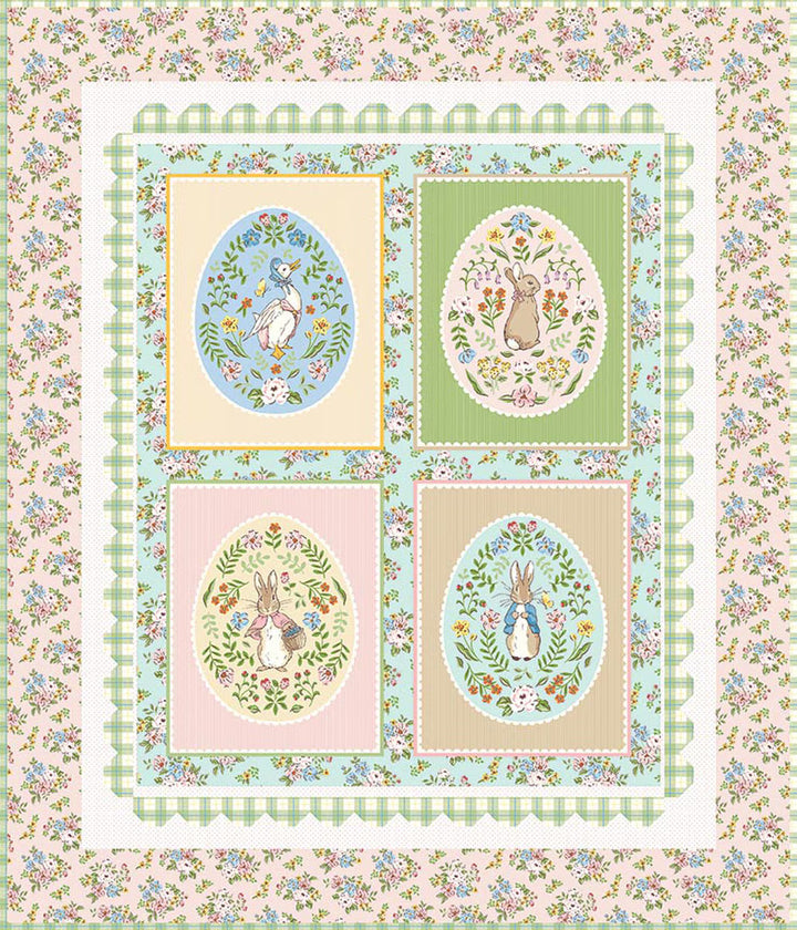 Quilt with four embroidered squares featuring rabbits and floral designs on a floral background.