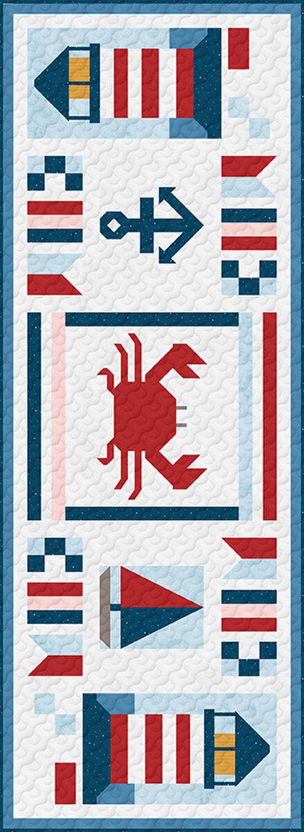 Nautical-themed quilt with crab, flags, and anchor design on a blue background