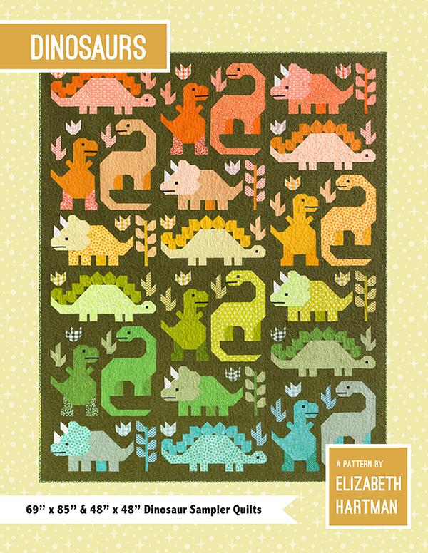 Pattern for dinosaur-themed quilts by Elizabeth Hartman on a green background