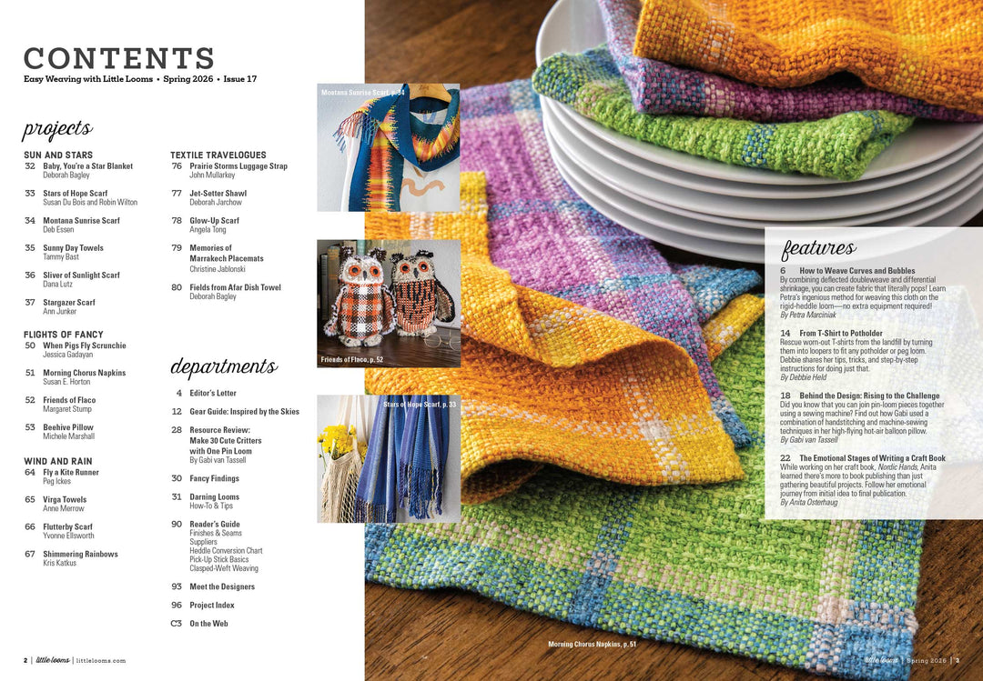 Magazine page with colorful knitted items and text on a wooden surface