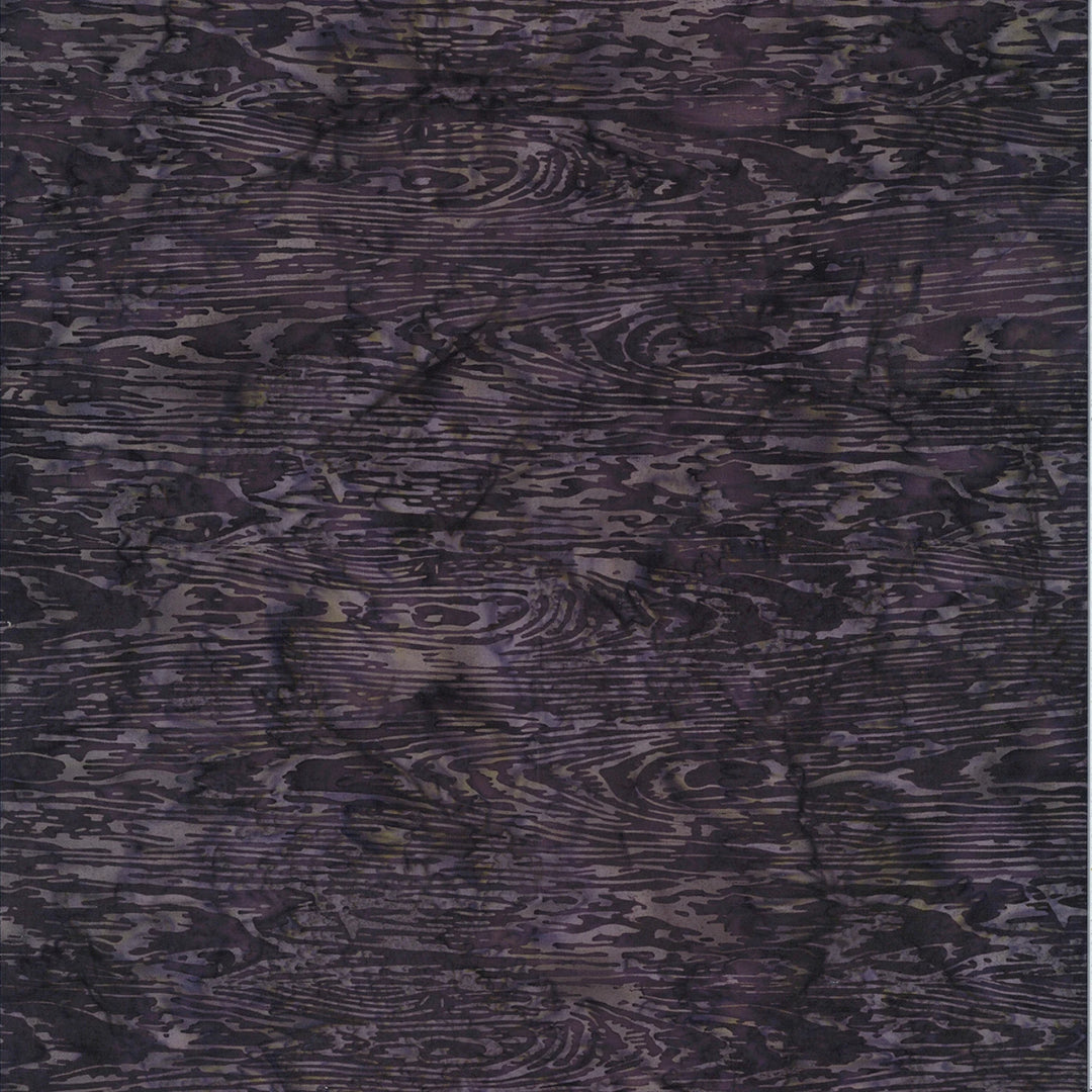 Textured purple fabric with a wood pattern