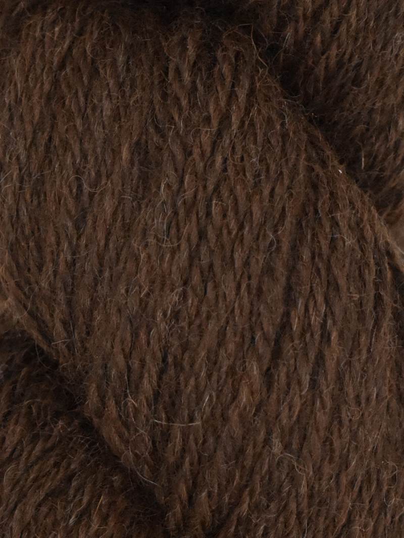 Close-up of brown yarn with a textured pattern