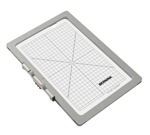 Grid embroidery hoop 'Bernina' branding on a white background