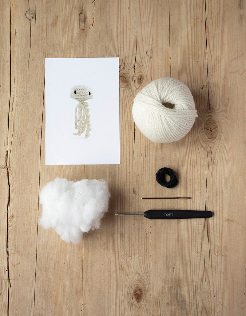Mini Mike the Jellyfish kit includes yarn, stuffing, needle, and crochet hook
