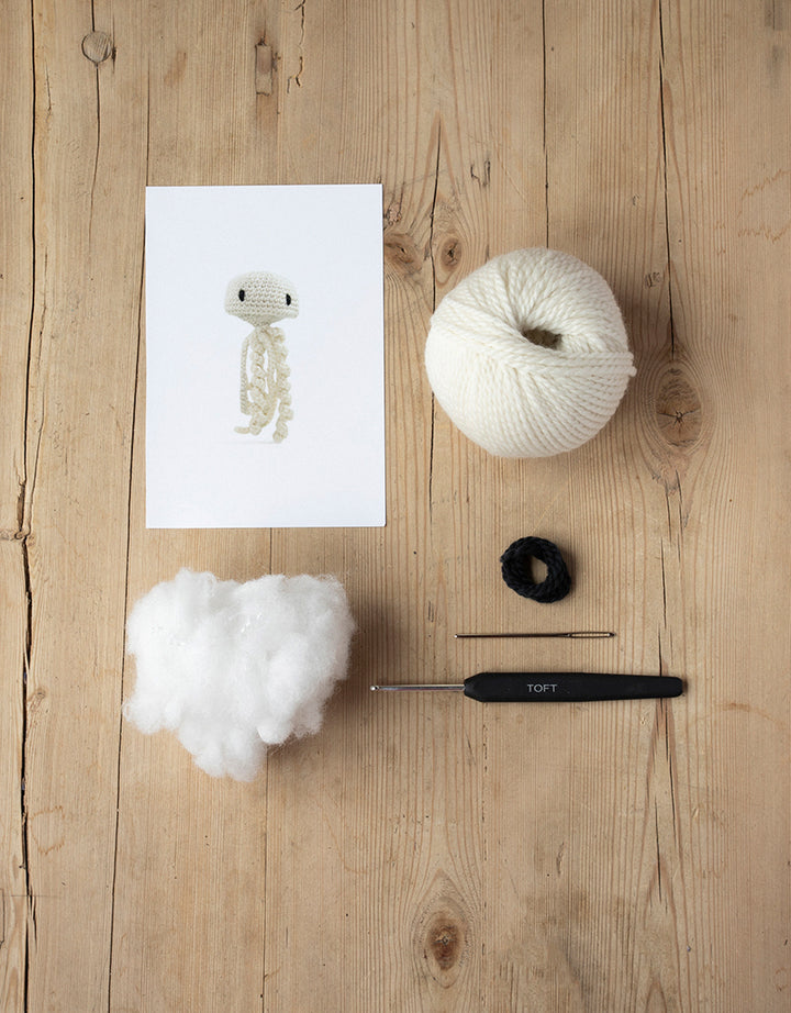 Mini Mike the Jellyfish kit includes yarn, stuffing, needle, and crochet hook