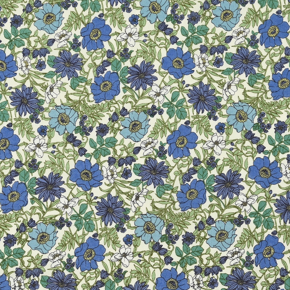 Pattern of blue flowers on a cream background