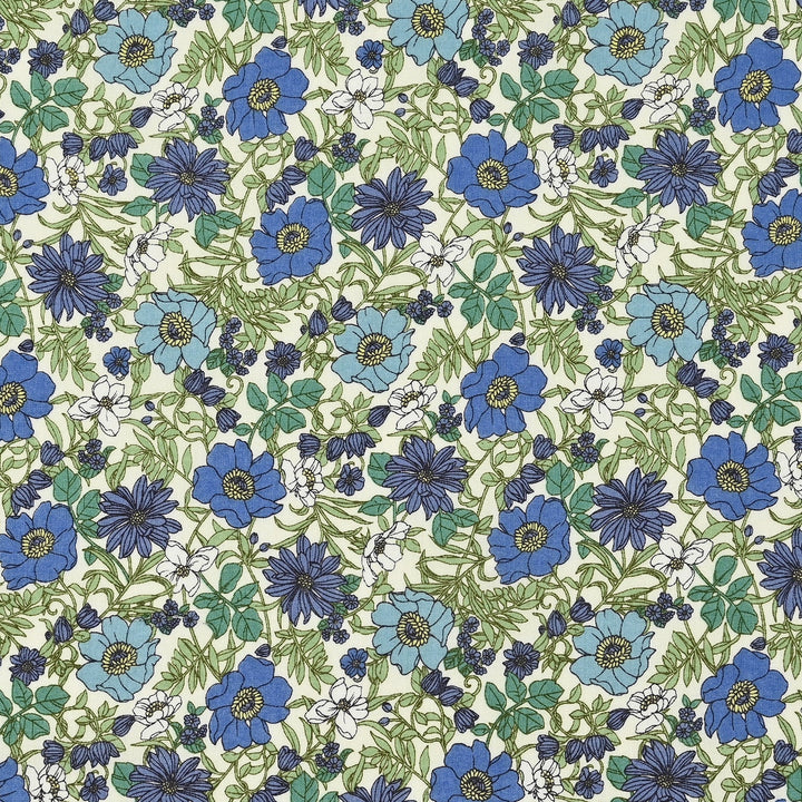 Pattern of blue flowers on a cream background