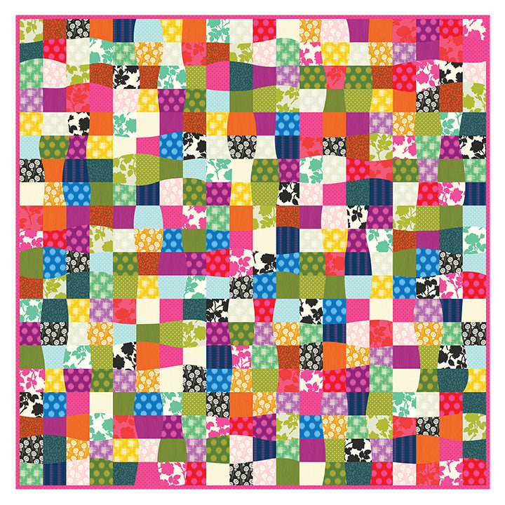 wavy patchwork quilt in a variety of bright colors