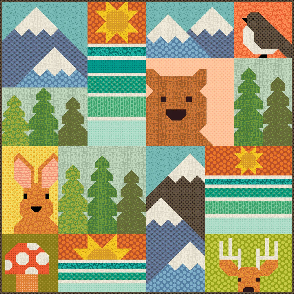 Patchwork-style quilt with animals, trees, and mountains in a colorful pattern.