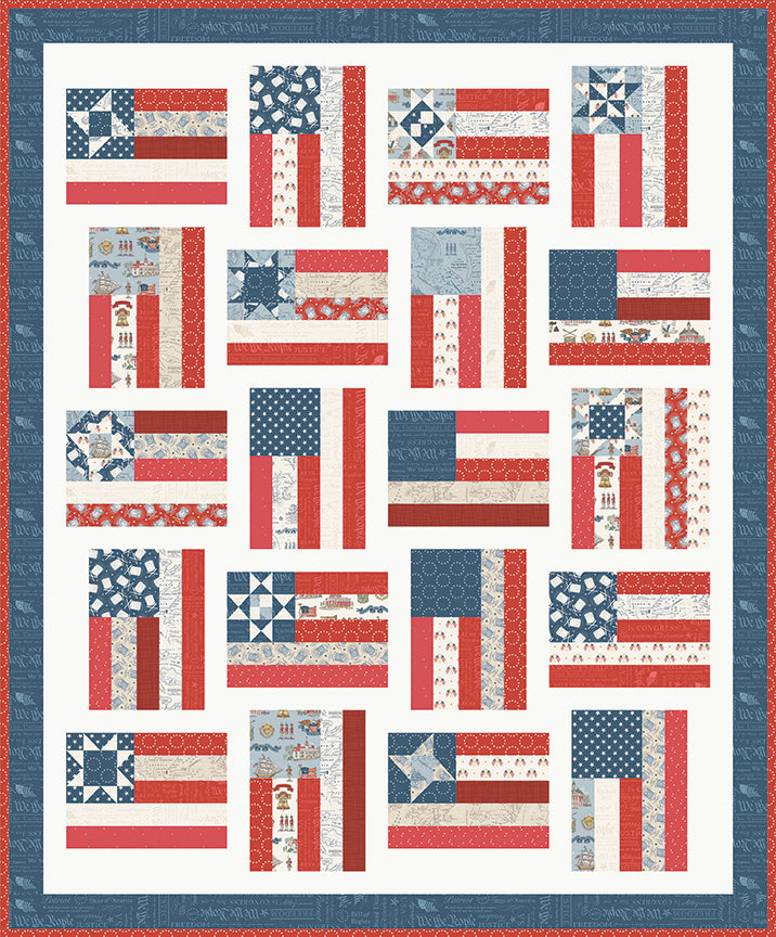 Quilt with various patterned American flags arranged in a grid on a white background.