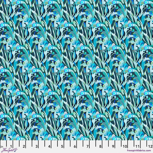 fabric swatch with greenery and circular florals in various shades of greens and blues and teals