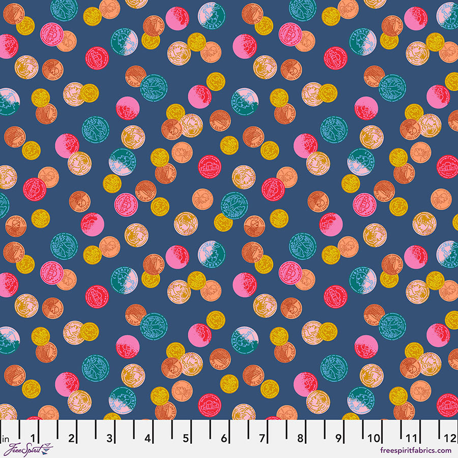 Colorful polka dot pattern on a blue background with a ruler at the bottom.