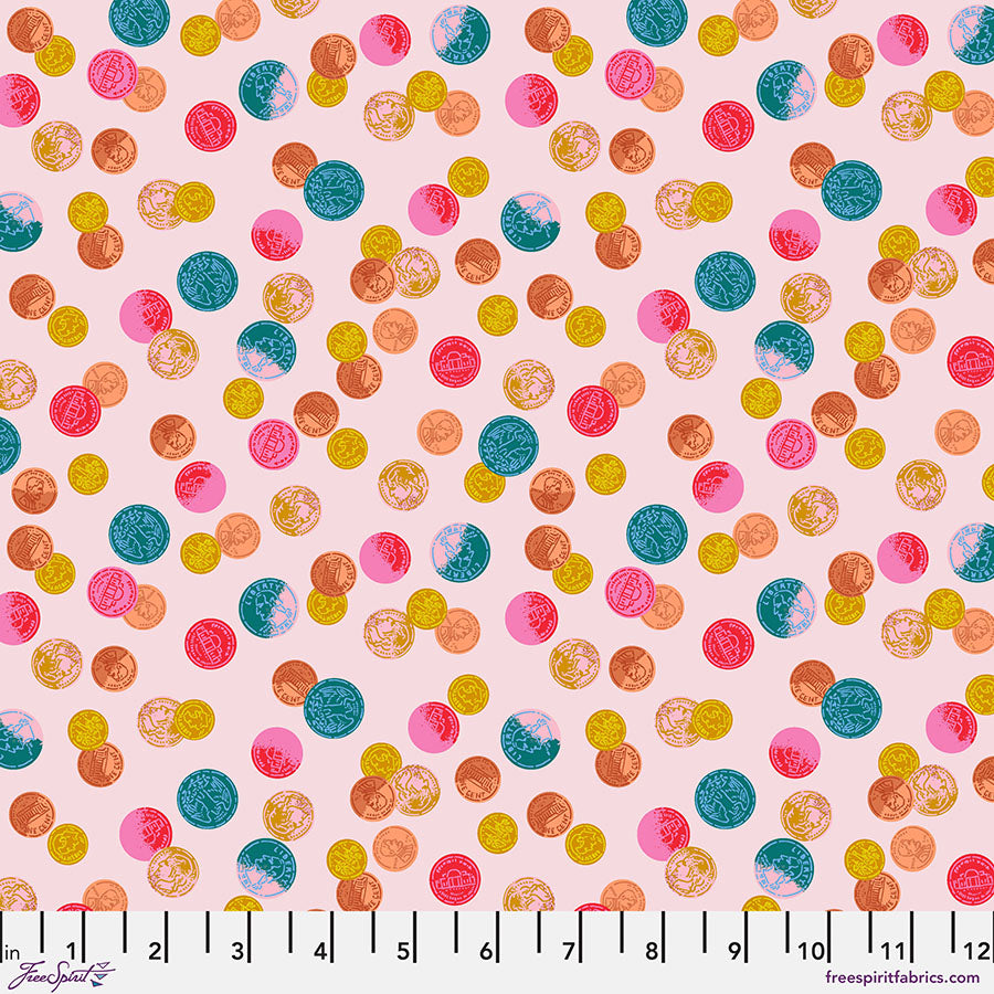Colorful polka dot pattern on a pink background with a ruler at the bottom.