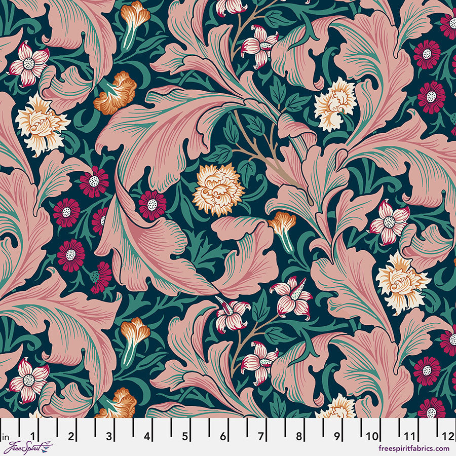 Floral and leaf pattern with a ruler at the bottom for scale, on a dark background.