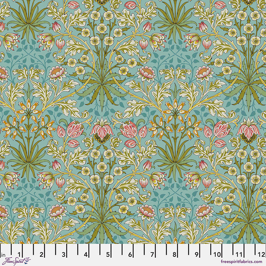Floral pattern fabric swatch with a ruler at the bottom
