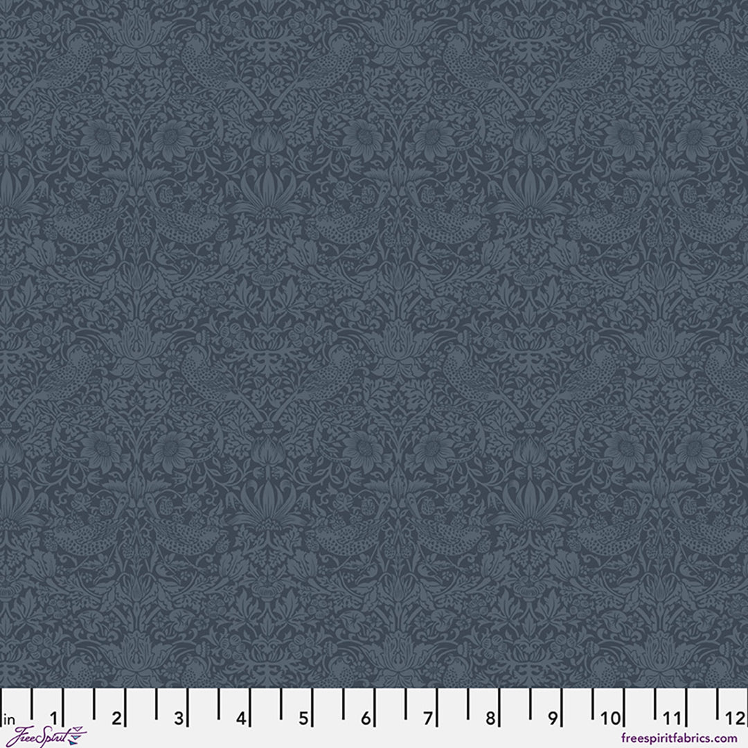 Dark blue fabric with a subtle pattern and a ruler at the bottom for scale.