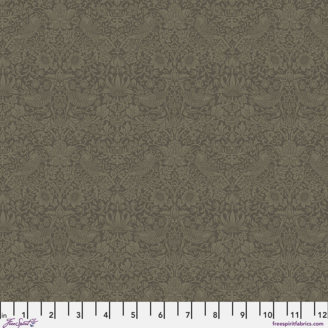 Dark gray fabric with subtle pattern and a ruler at the bottom for scale.