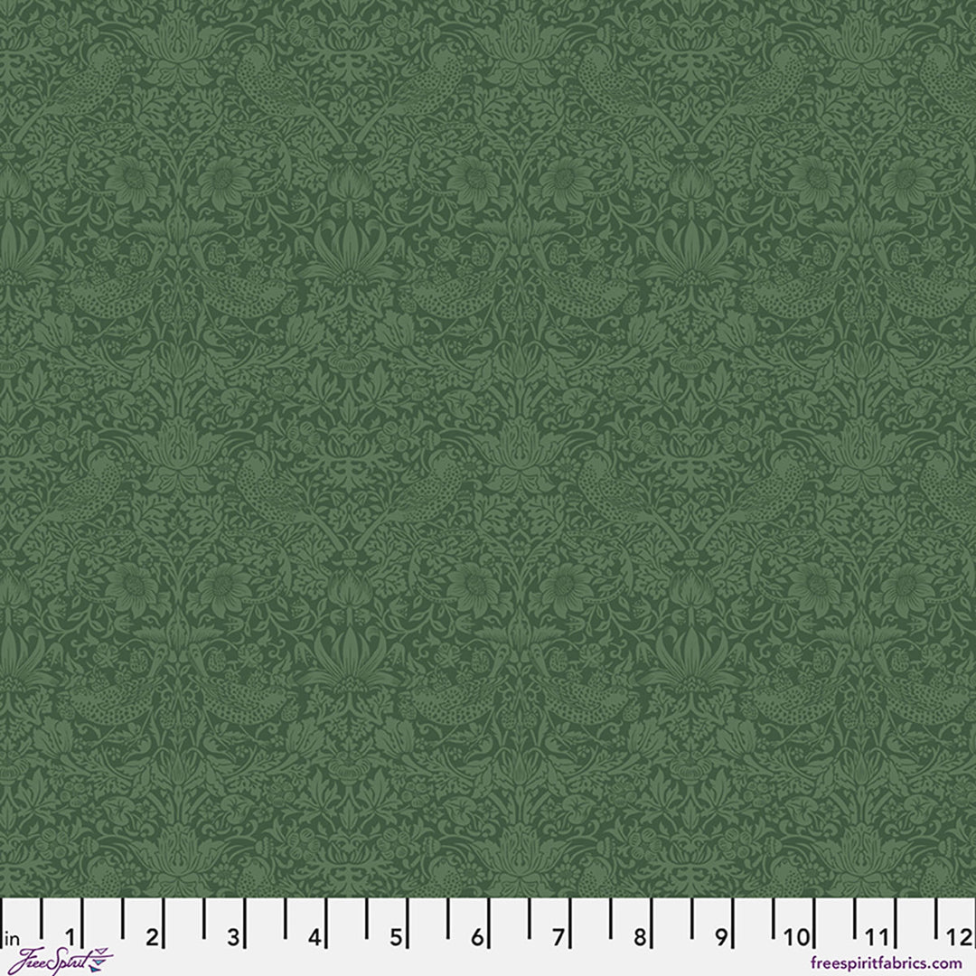 Green fabric with a subtle pattern on a plain background