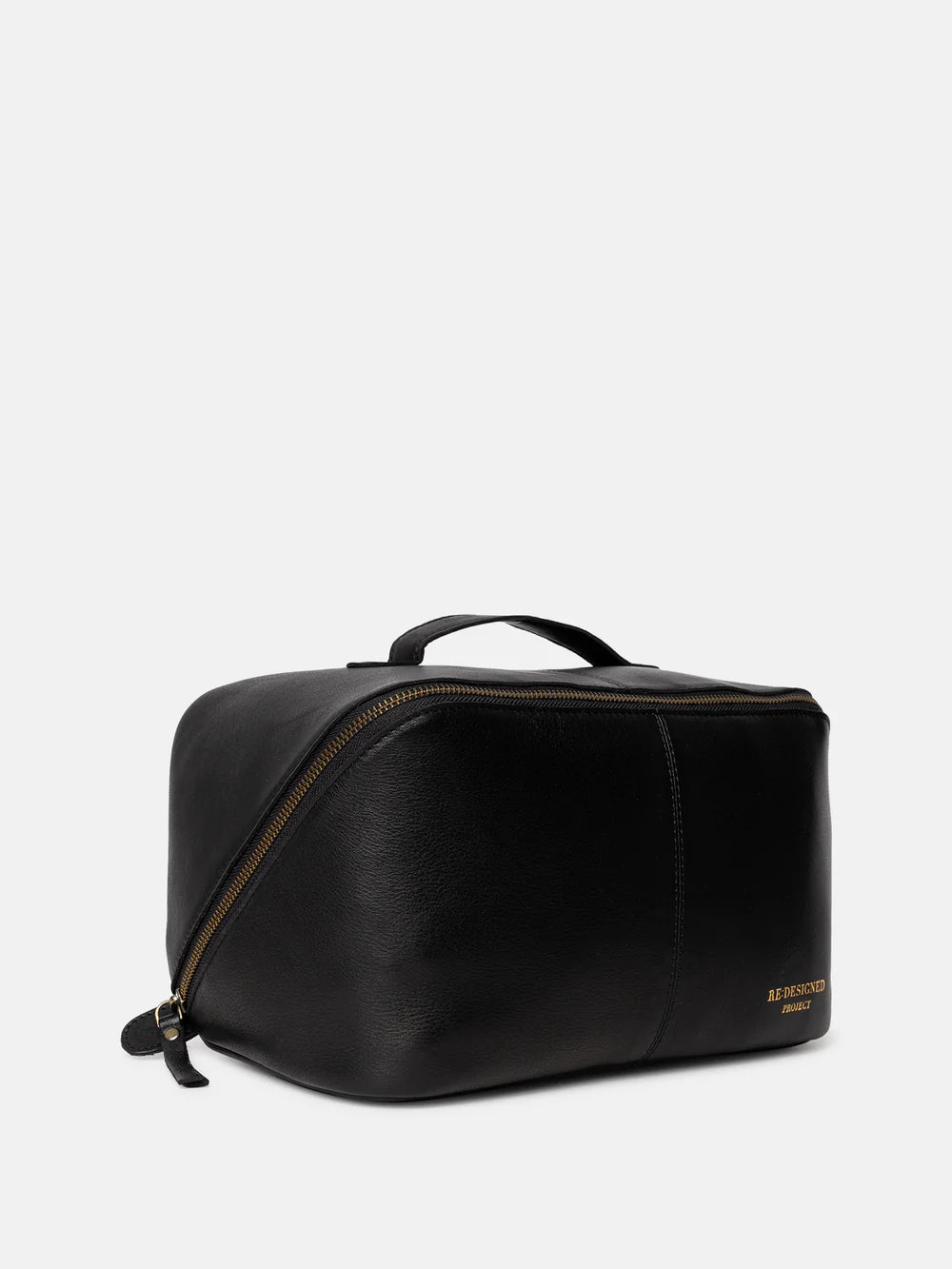 Black leather toiletry bag with gold zipper on a white background