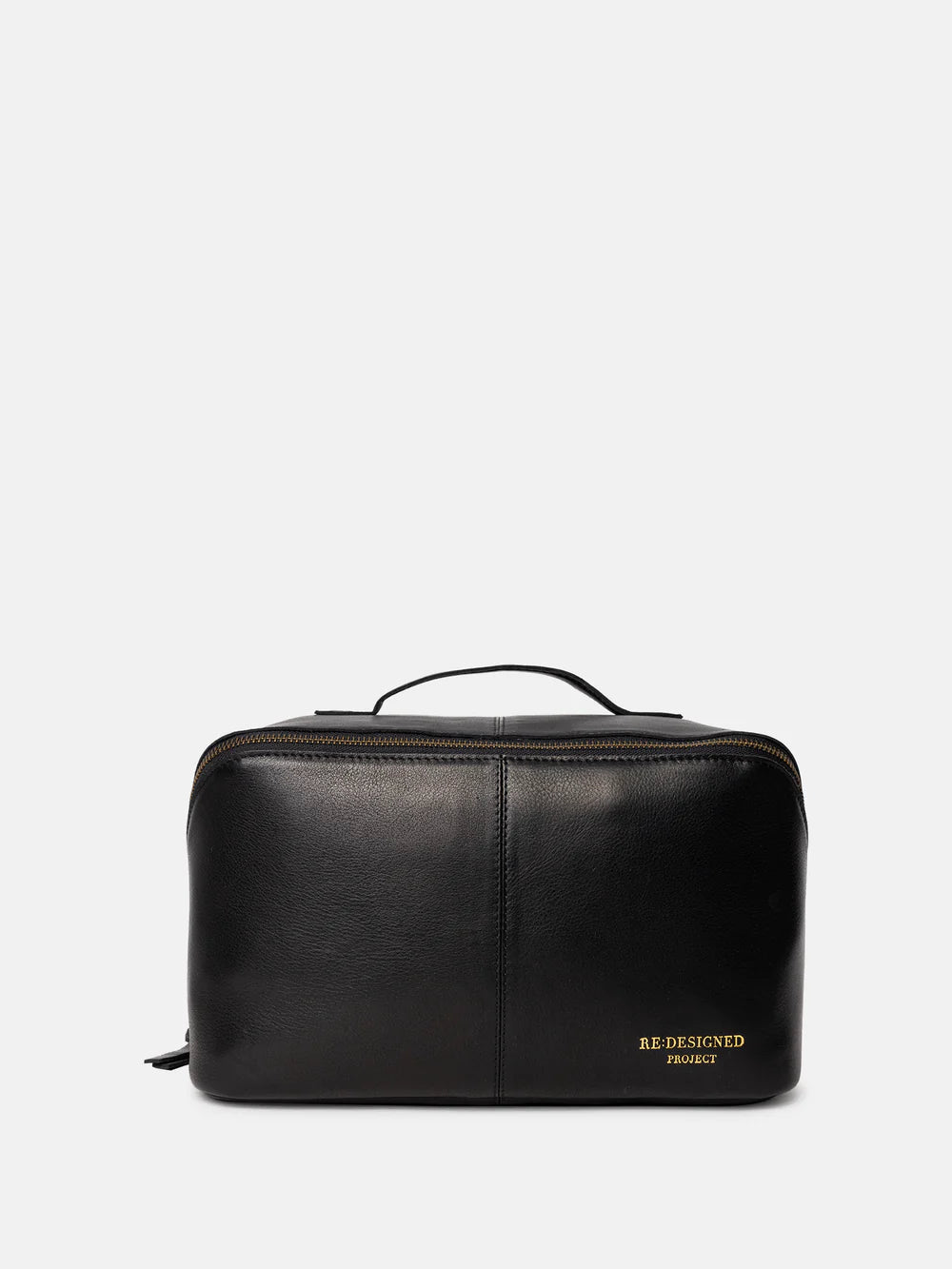 Black leather toiletry bag with 'RE DESIGNED' branding on a white background