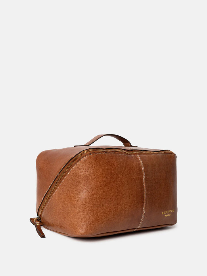 Brown leather knitting bag on a white background