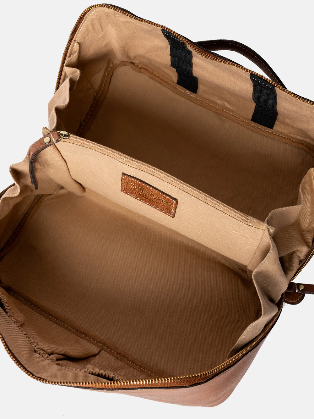 Open brown leather bag with visible brand logo on a white background