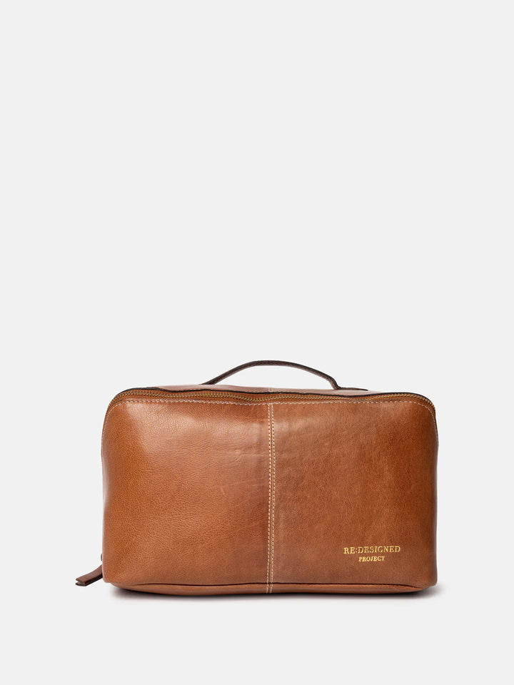 Brown leather knitting bag on a white background