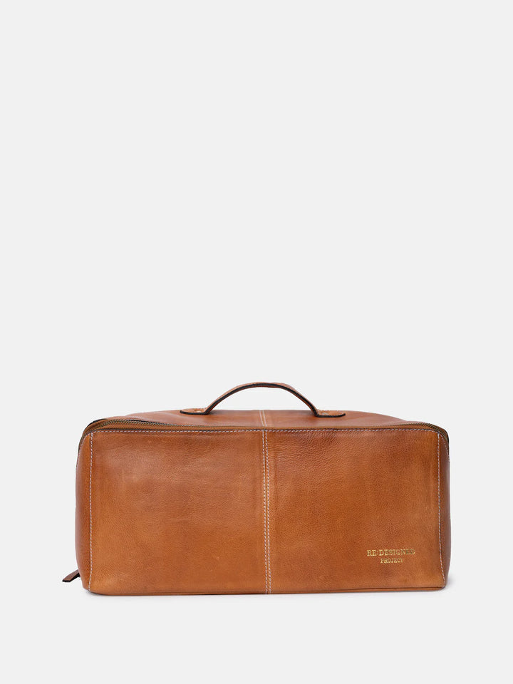 Brown leather knitting case on a white background