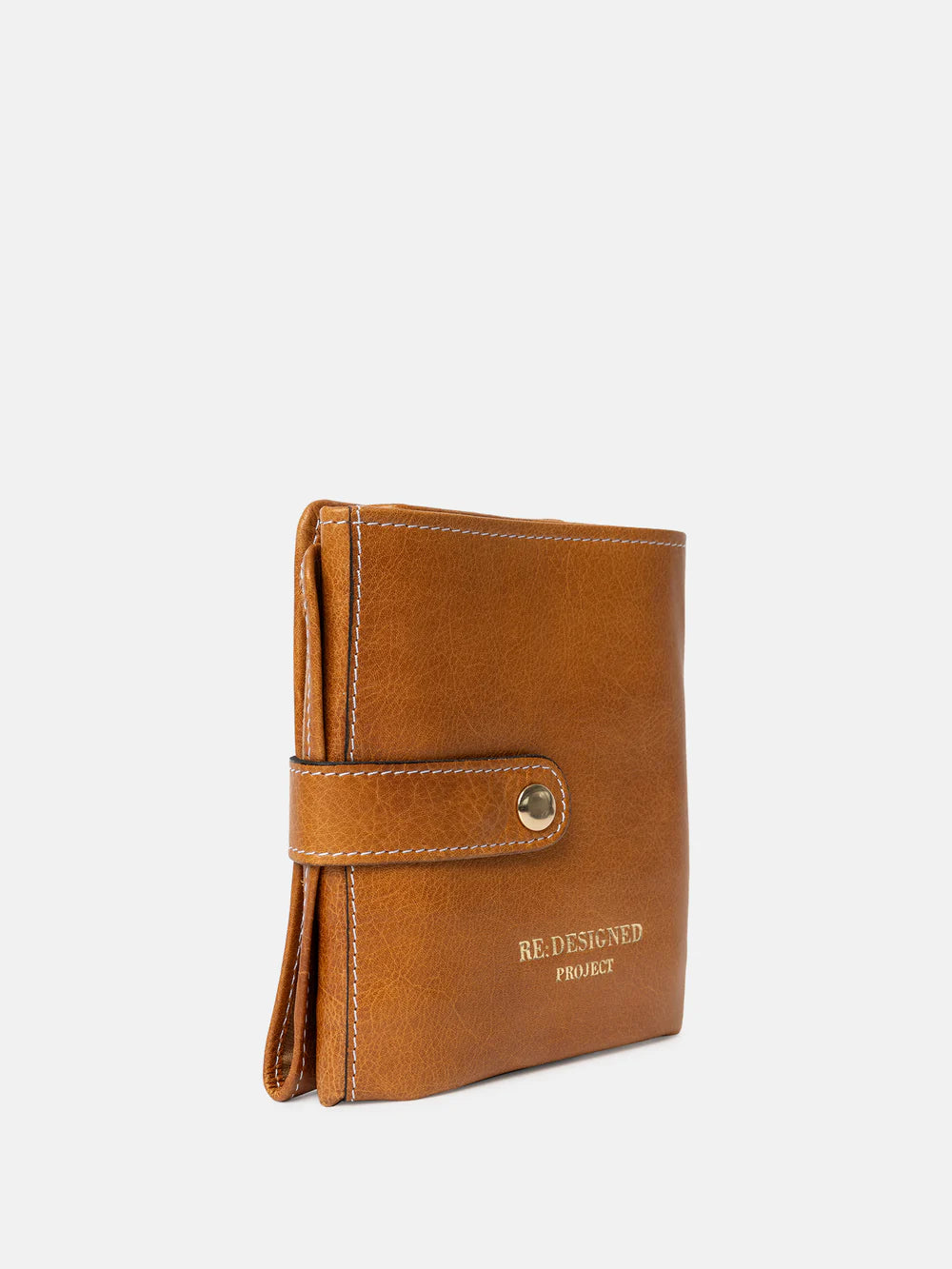 Brown leather needle case with 'RE-DESIGNED PROJECT' branding on a white background