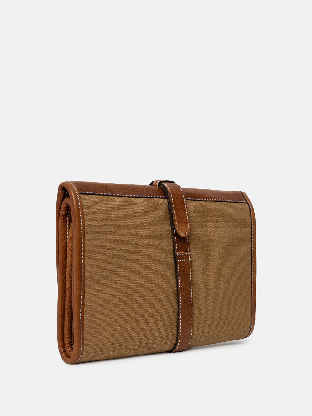 Brown leather needle case on a light beige background