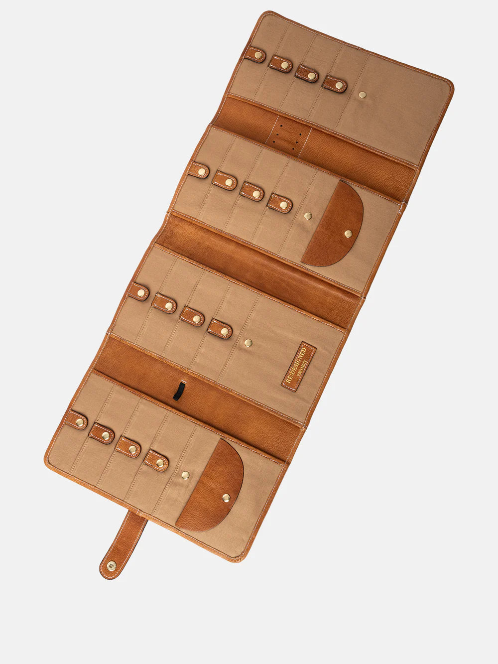 Brown leather needle case with gold accents on a white background