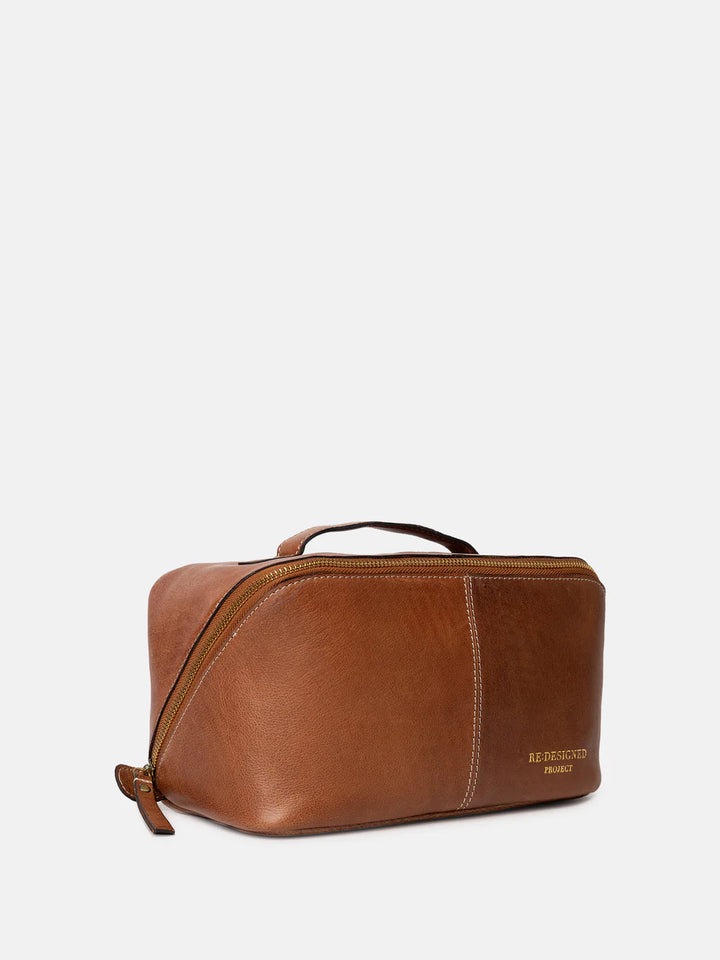 Brown leather knitting bag on a white background