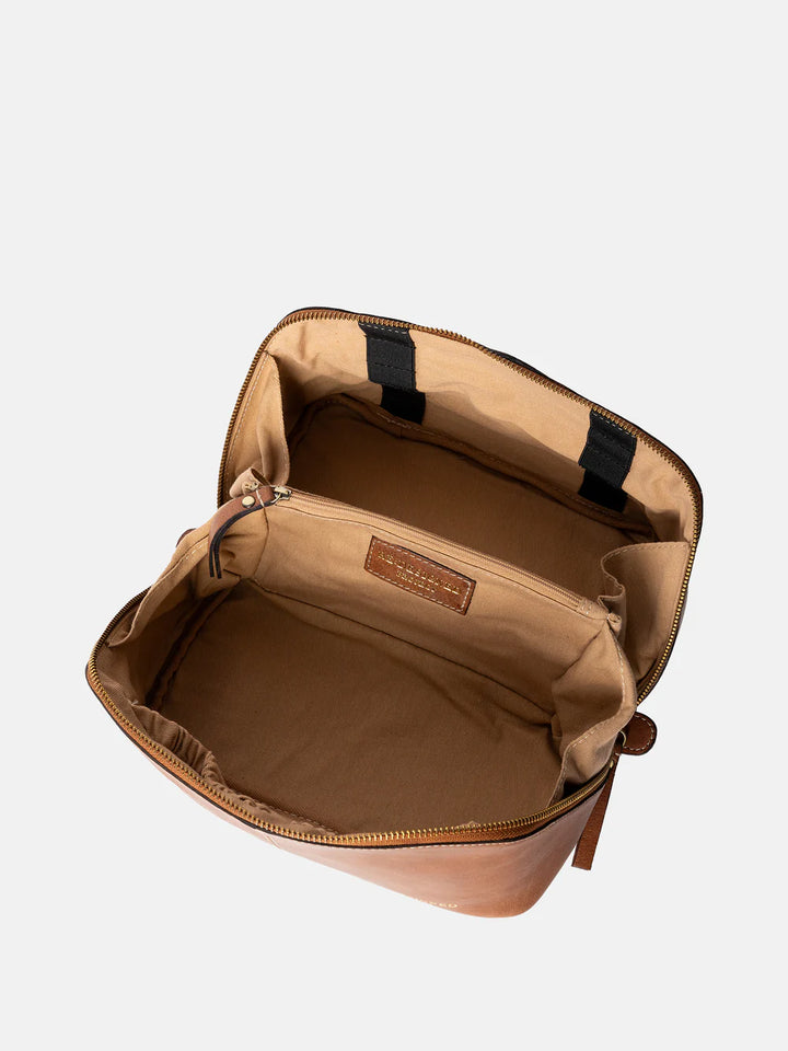 Brown knitting bag open with a visible brand label on a white background