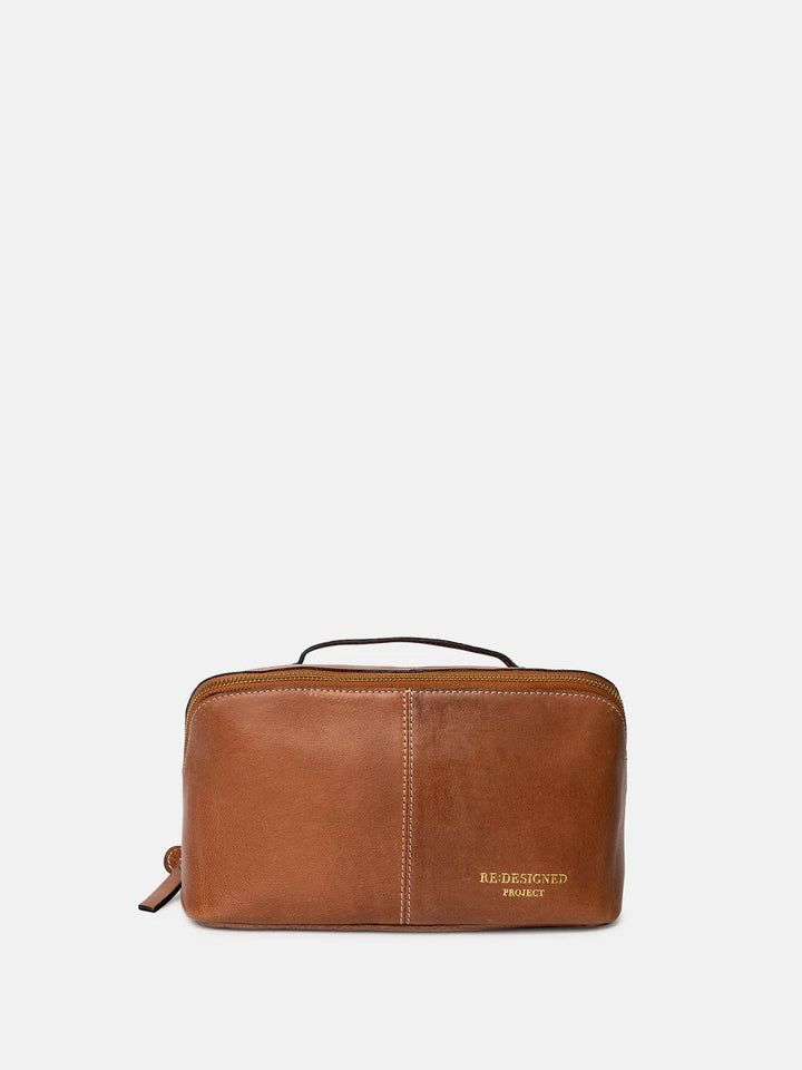 Brown leather knitting bag on a white background