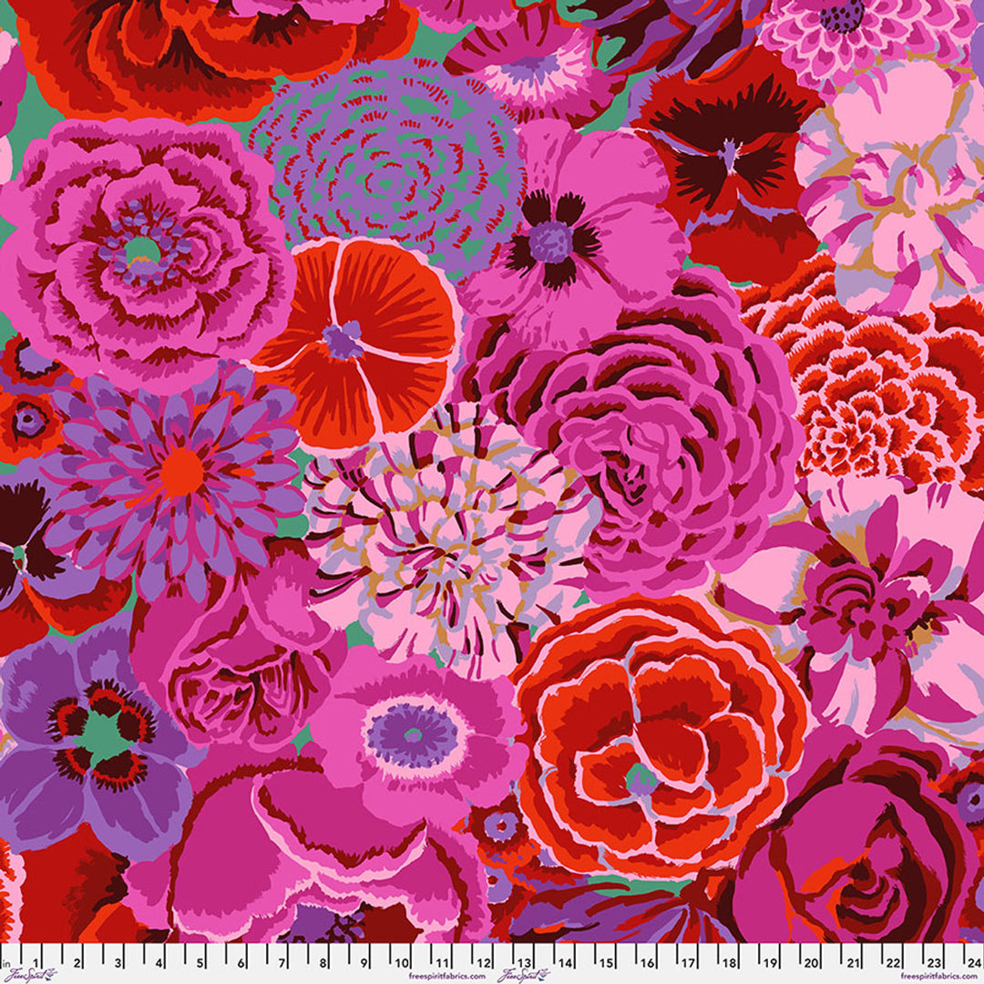 Colorful floral pattern with pink, red, and purple flowers on a fabric swatch.
