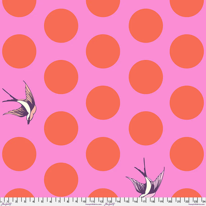 Fabric with a pink background, red large dots, and birds flying 