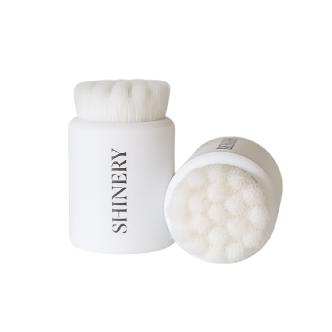 White jar with a brush on a white background, featuring the brand 'Shinery'.