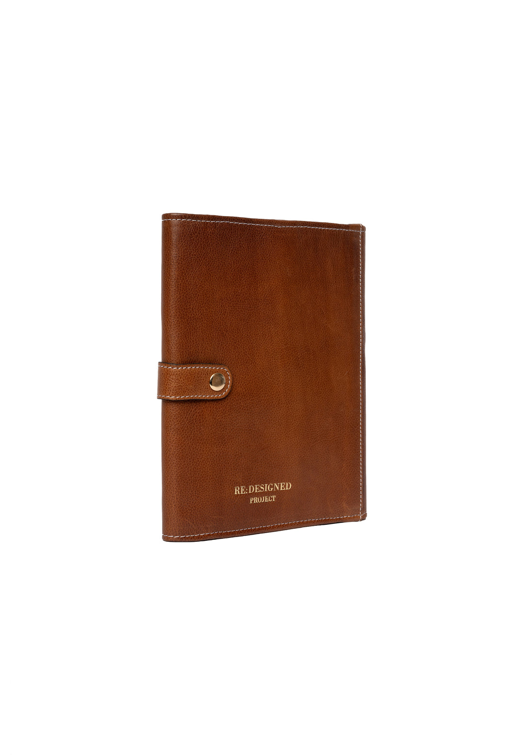 A closed walnut brown leather needle case with a gold accent on the snap closure.