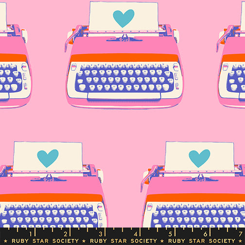 Pattern of pink typewriters with blue hearts on a pink background, featuring the Ruby Star Society label.