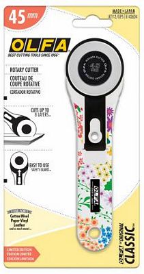 OLFA rotary cutter on its packaging with floral design