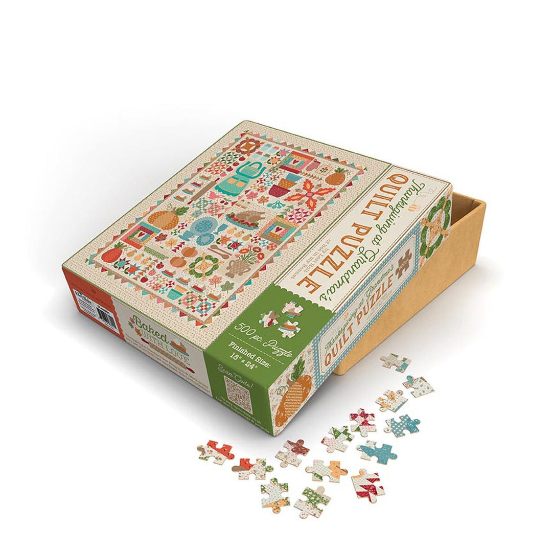 Quilt-themed puzzle box with puzzle pieces on a white background