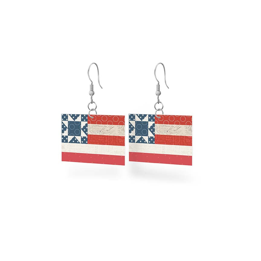 Pair of earrings with American flag design on a white background