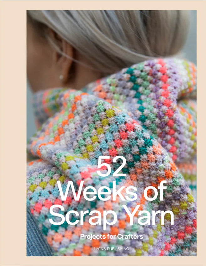 A book cover with a close up photo of the back of a blonde woman wearing a multicolored shawl wrapped around her neck. The title is across the picture in a simple white font.