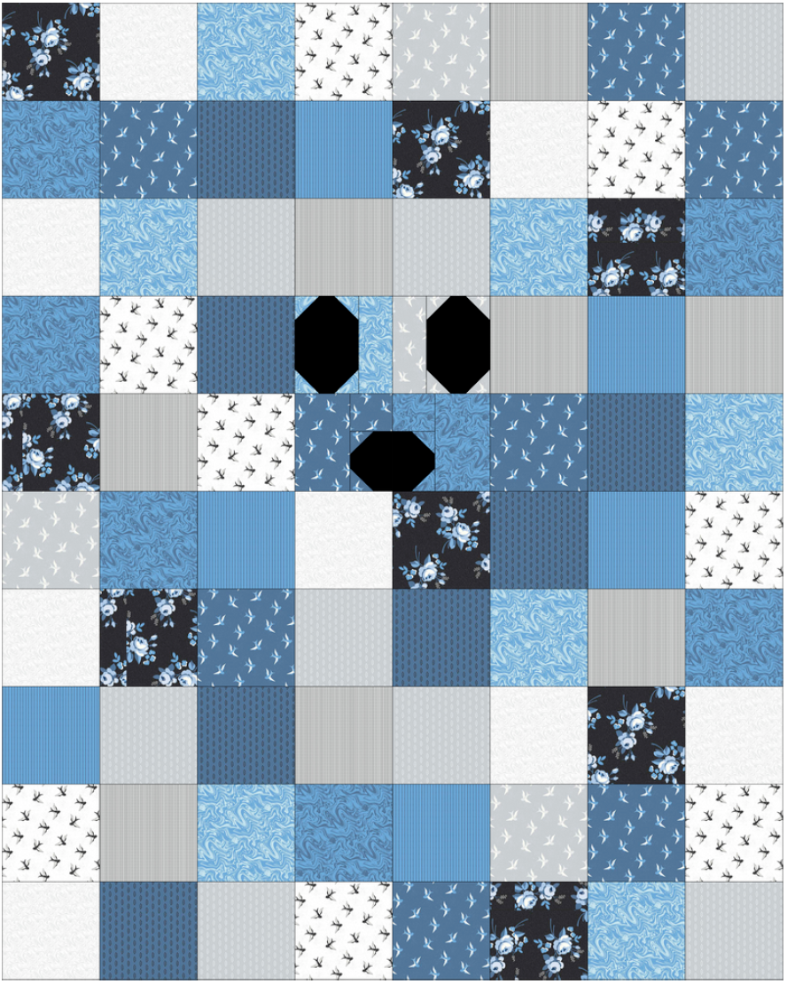 Patchwork quilt with blue, gray, and black squares.