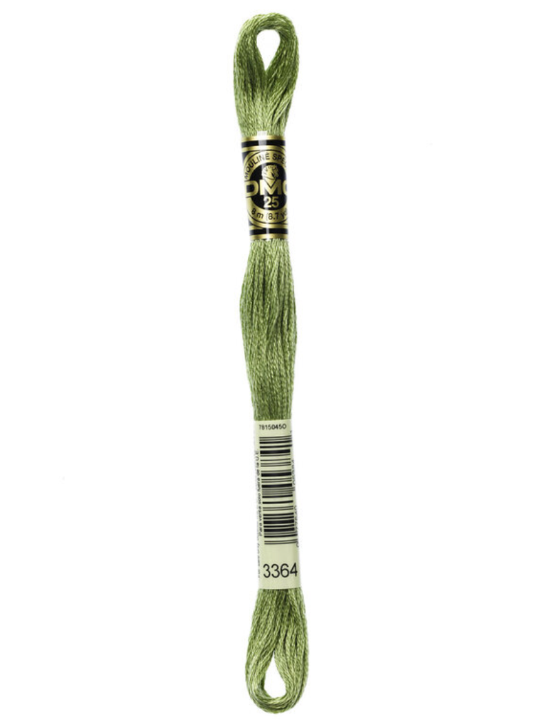 Green embroidery floss with a label on a white background