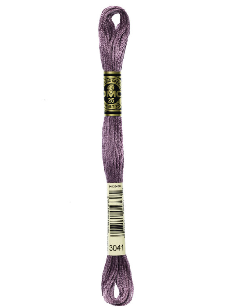 Purple embroidery floss with a label on a white background