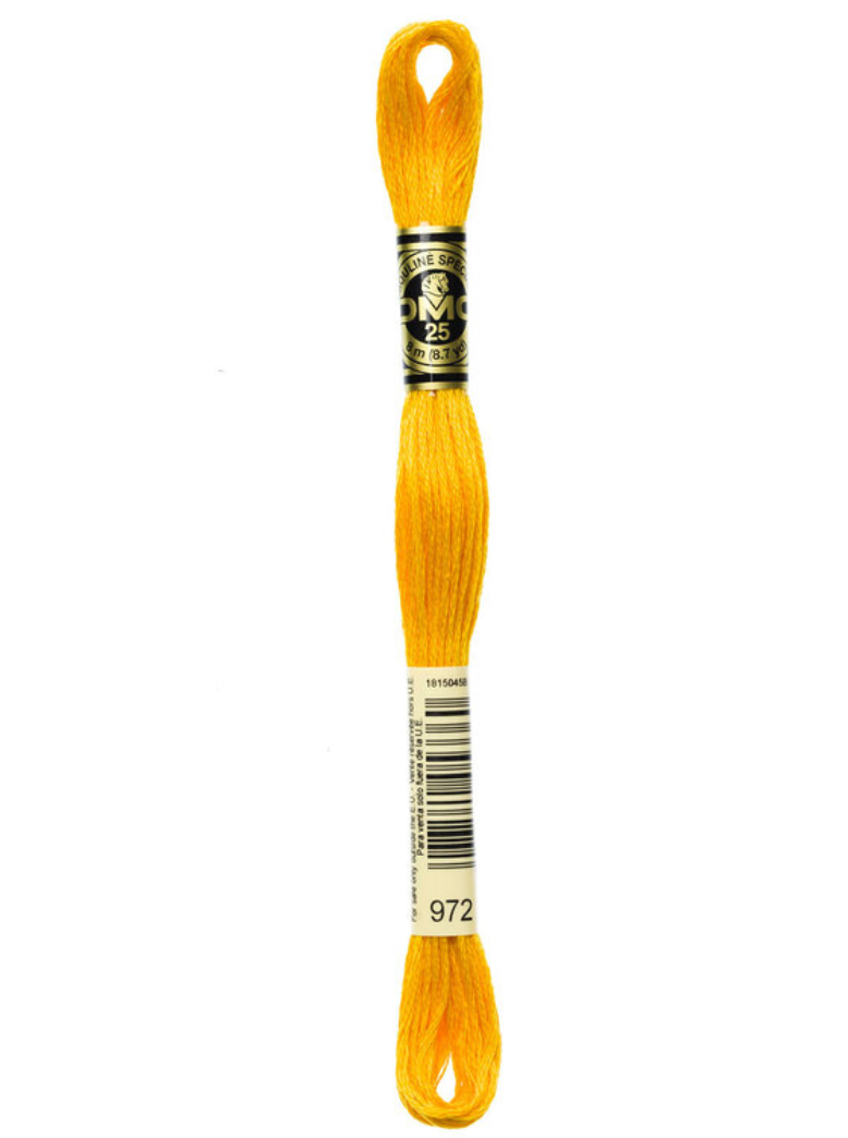 Yellow embroidery floss with a brand label on a white background
