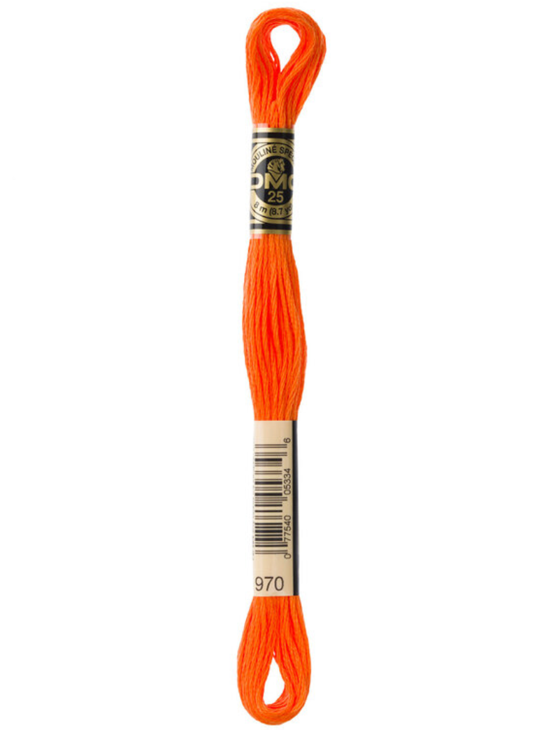 Orange embroidery floss with a brand label on a white background